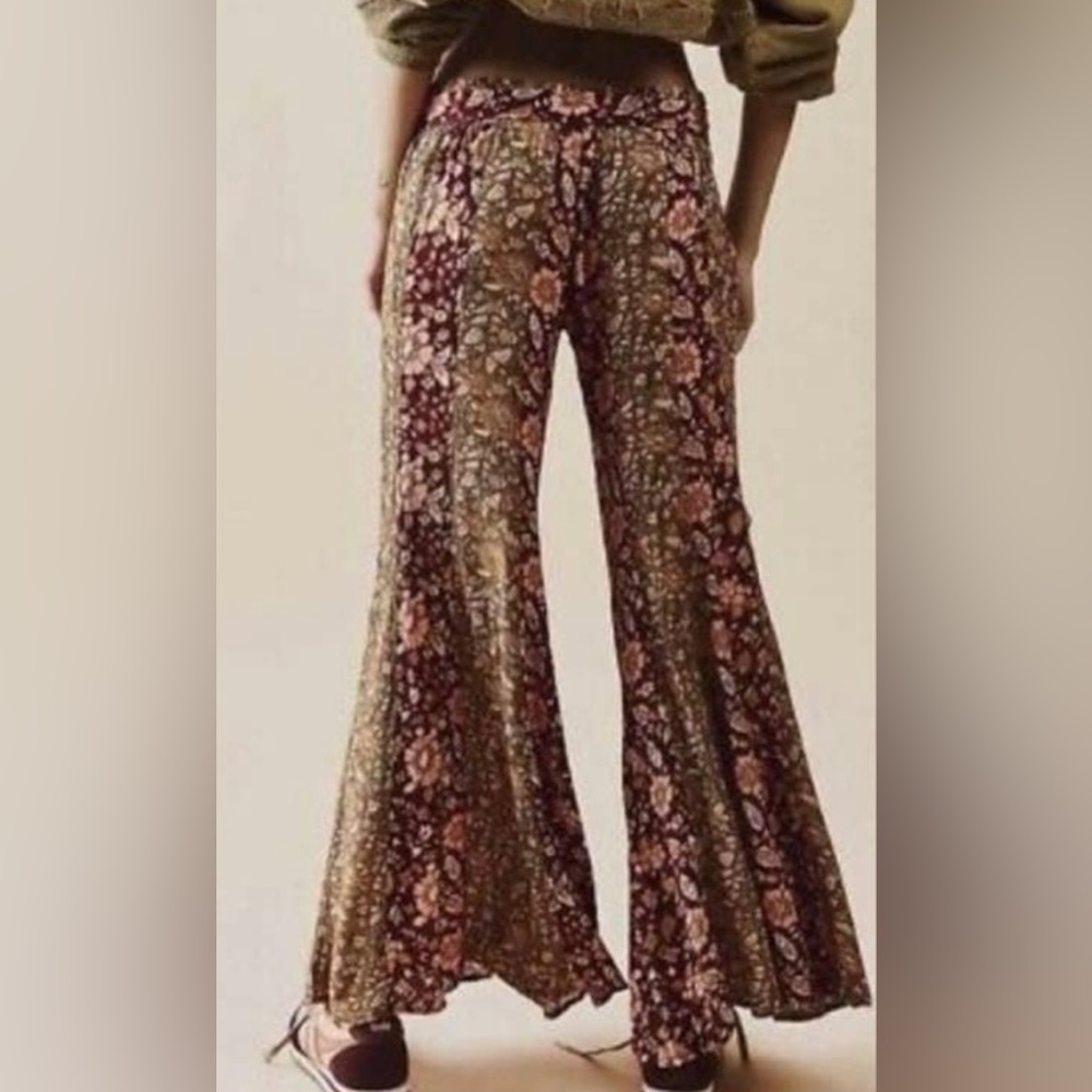 NWOT! Free People Bali Boho flare pants. Color multi reds and greens. Sizes: M,L - Picture 7 of 14